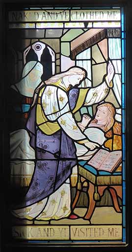 Image of a person pointing to a book and other arm raised alongside someone in a bed with what appears to be an attending nurse-nun in the background